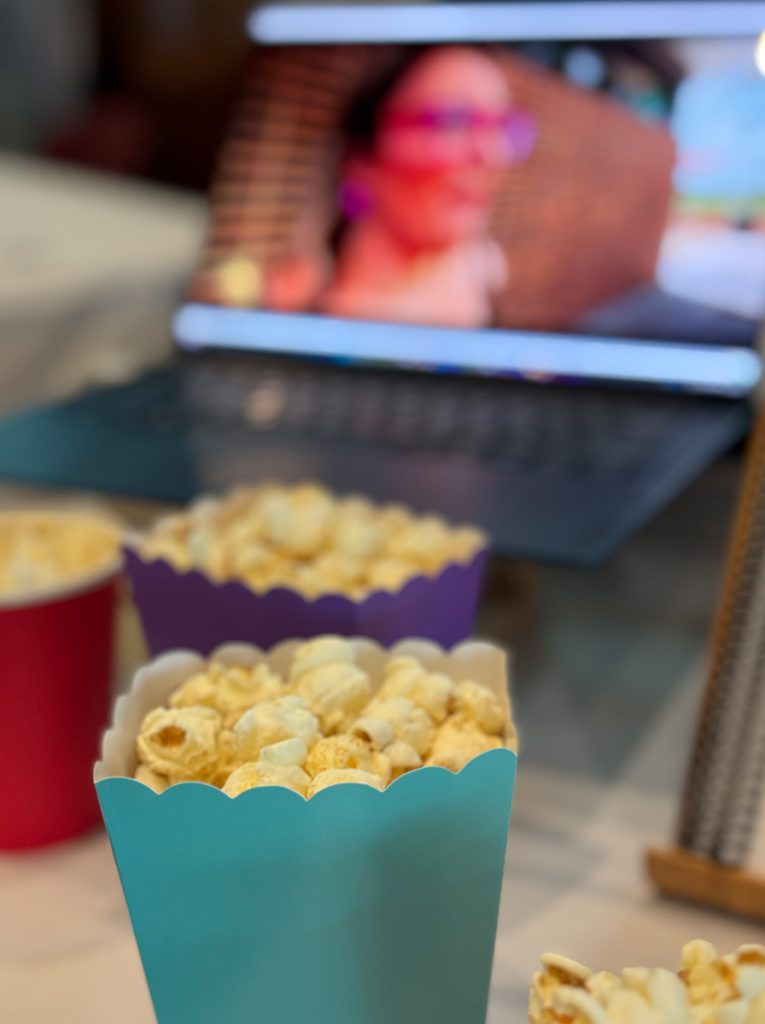 Watching videos with popcorn at the event