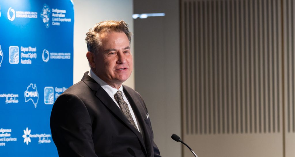 Professor Paul Flatau speaking at event